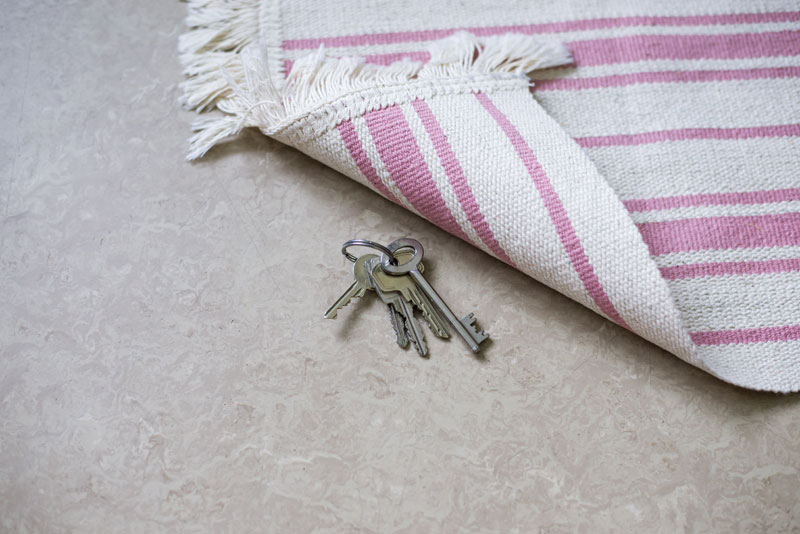 Hidden Key Under the Doormat - Locksmith Dubai
